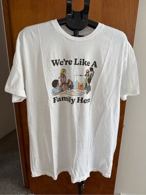White Graphic Tee "We're Like A Family Here"
